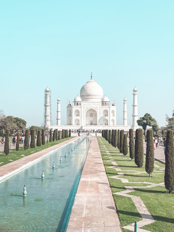 Stunning front view of the Taj Mahal in Agra, India, showcasing its architectural beauty.